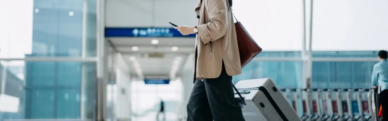 woman walking thru airport